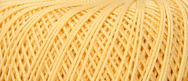 Ball of Puppets Eldorado No 10 cotton yarn in pale gold