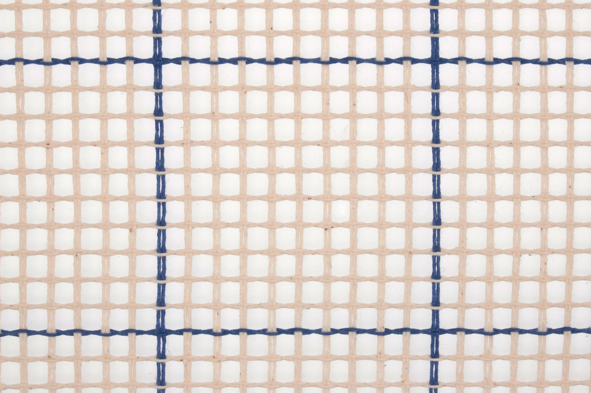 Roll of natural Zweigart rug canvas with grid lines