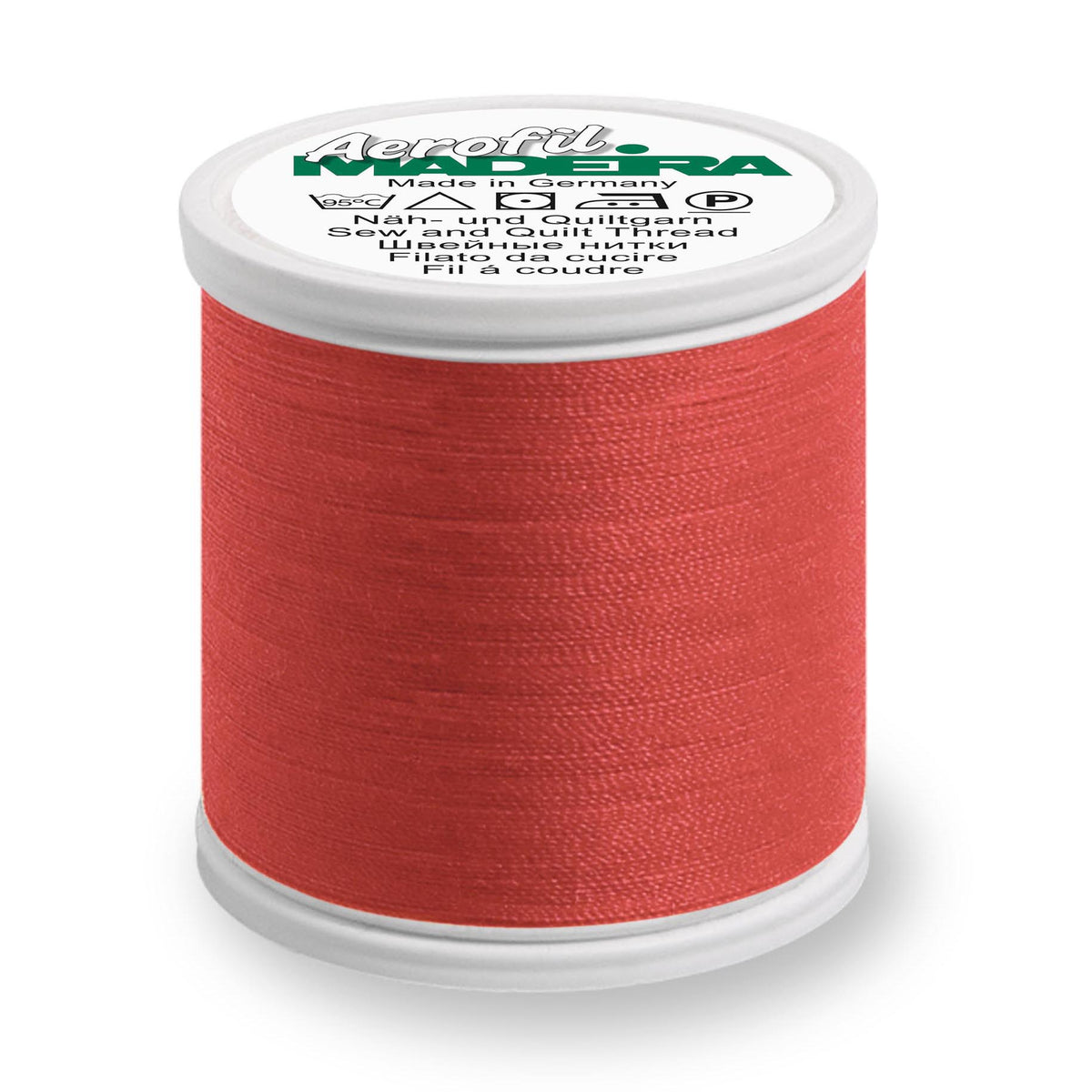 Spool of Madeira Aerofil sewing thread in coral