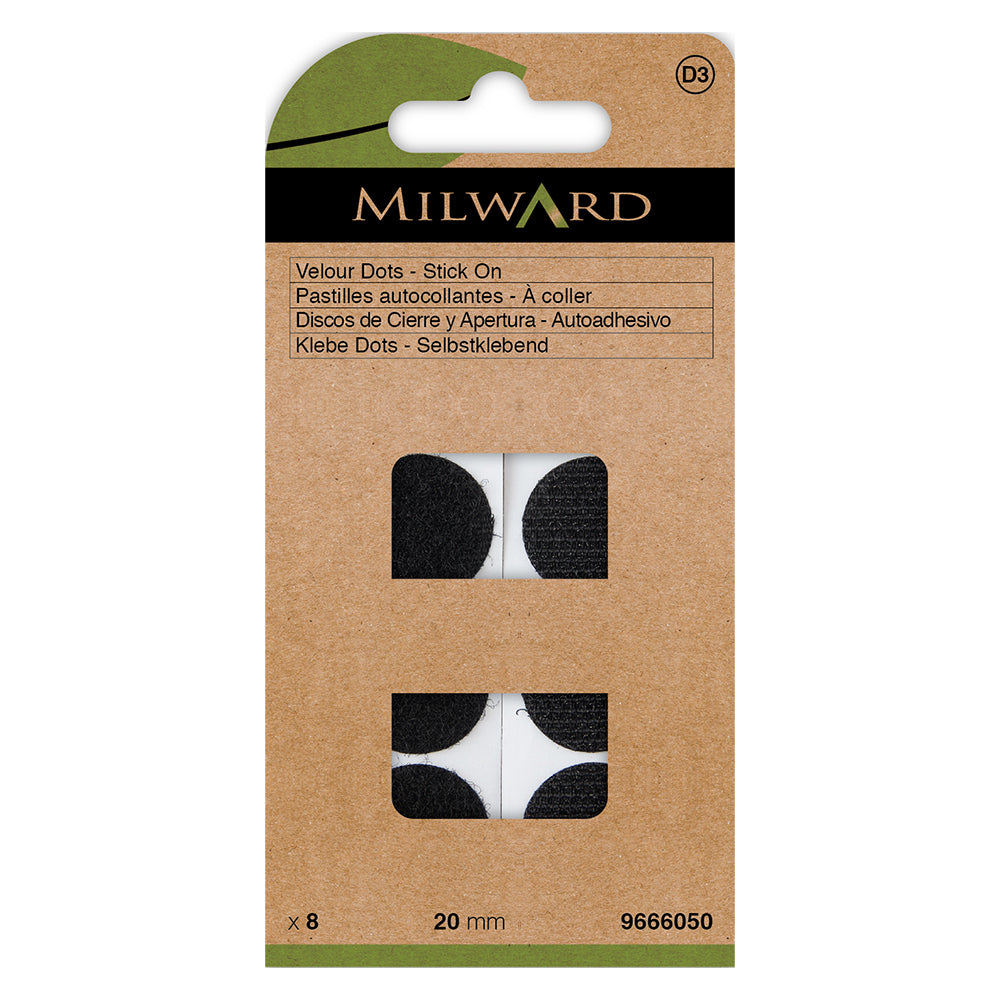 Black round hook and loop dots on a backing sheet
