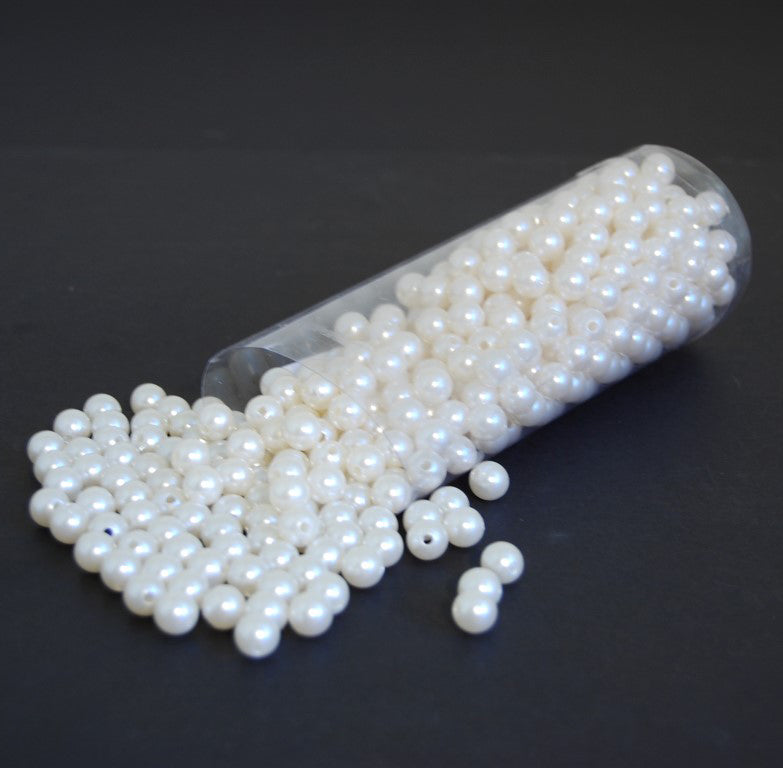 Tube of ivory 10mm loose beads