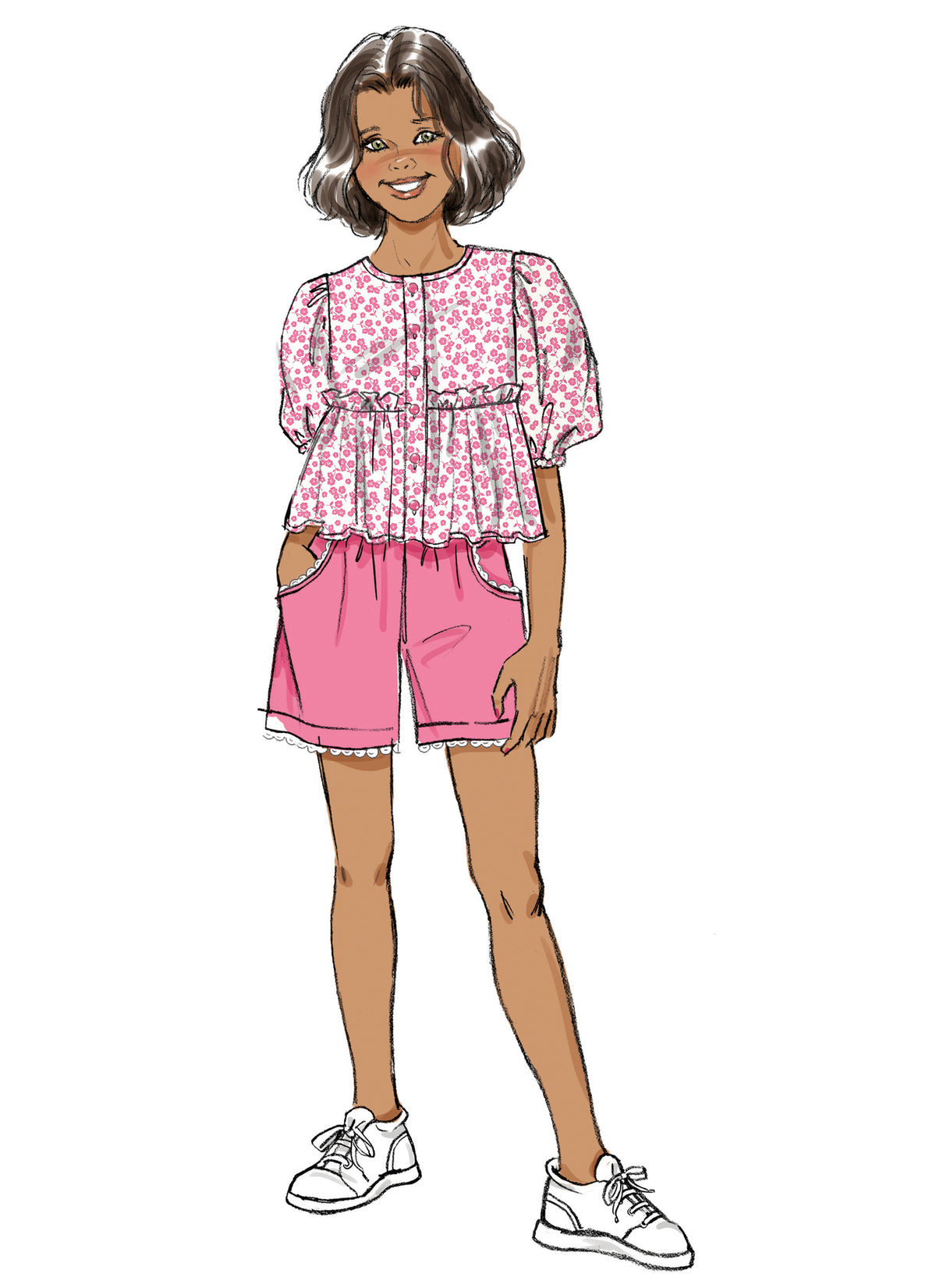 Butterick B7034 sewing pattern envelope showing girls' top designs