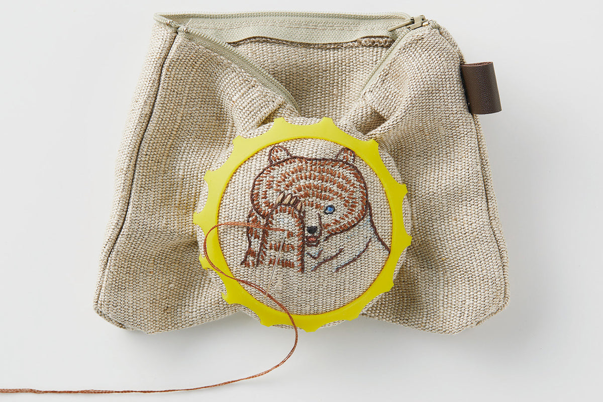 Clover Stitch Dome embroidery tool with elastic band