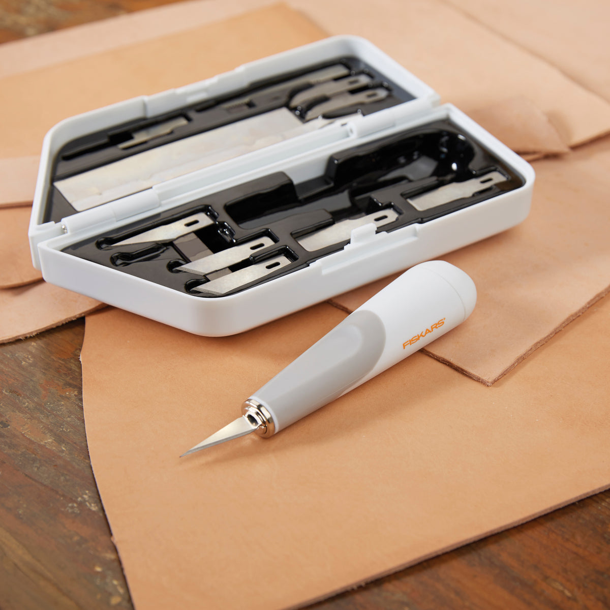 Fiskars heavy-duty craft knife with blades in a plastic case