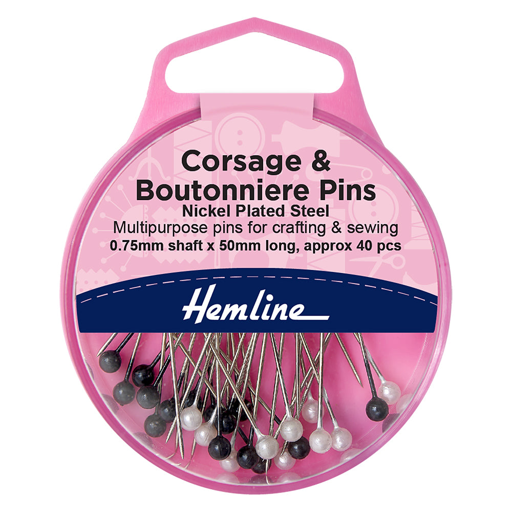 Hemline case of black and white head corsage pins