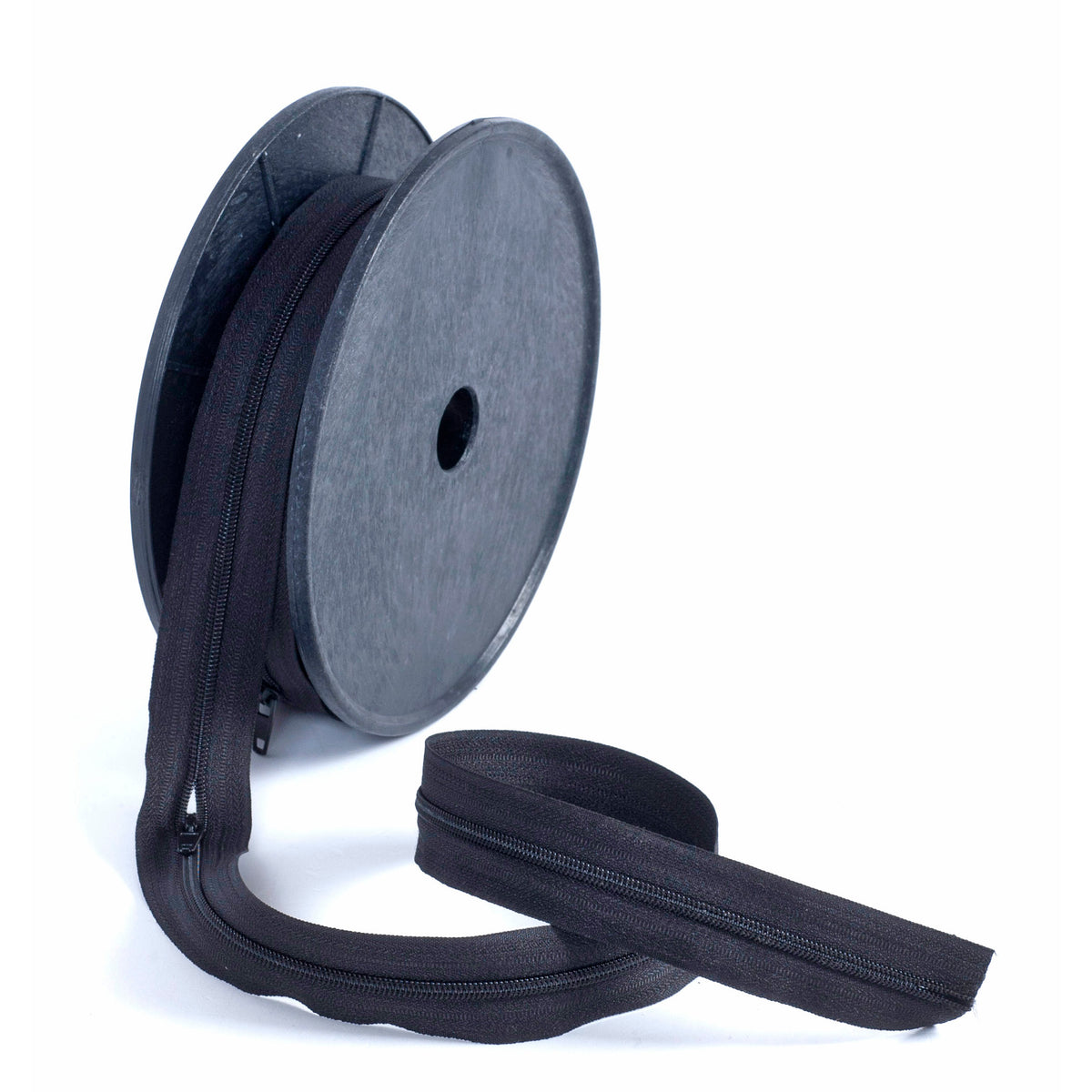 Roll of black continuous nylon zip with sliders