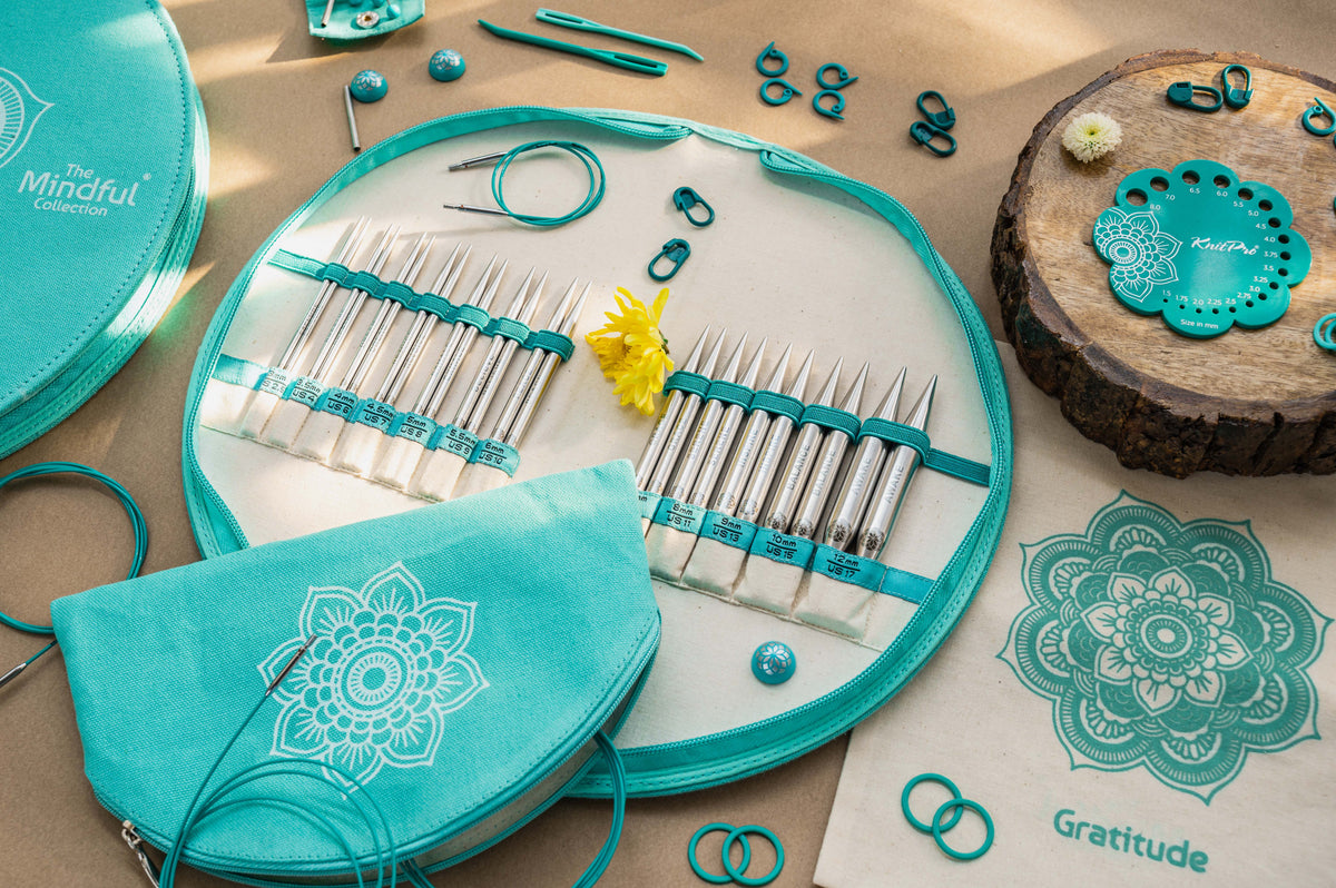 KnitPro Mindful Warmth interchangeable needle set in a semi-circular mandala fabric case