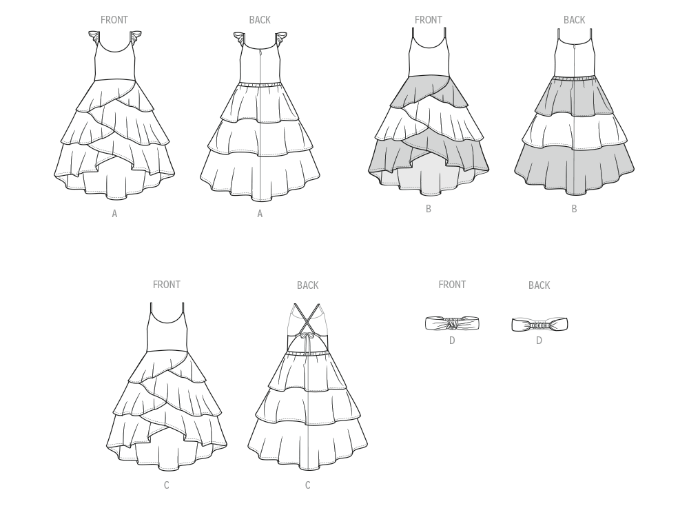 McCall's M8592 sewing pattern envelope showing girls' layered dresses designs