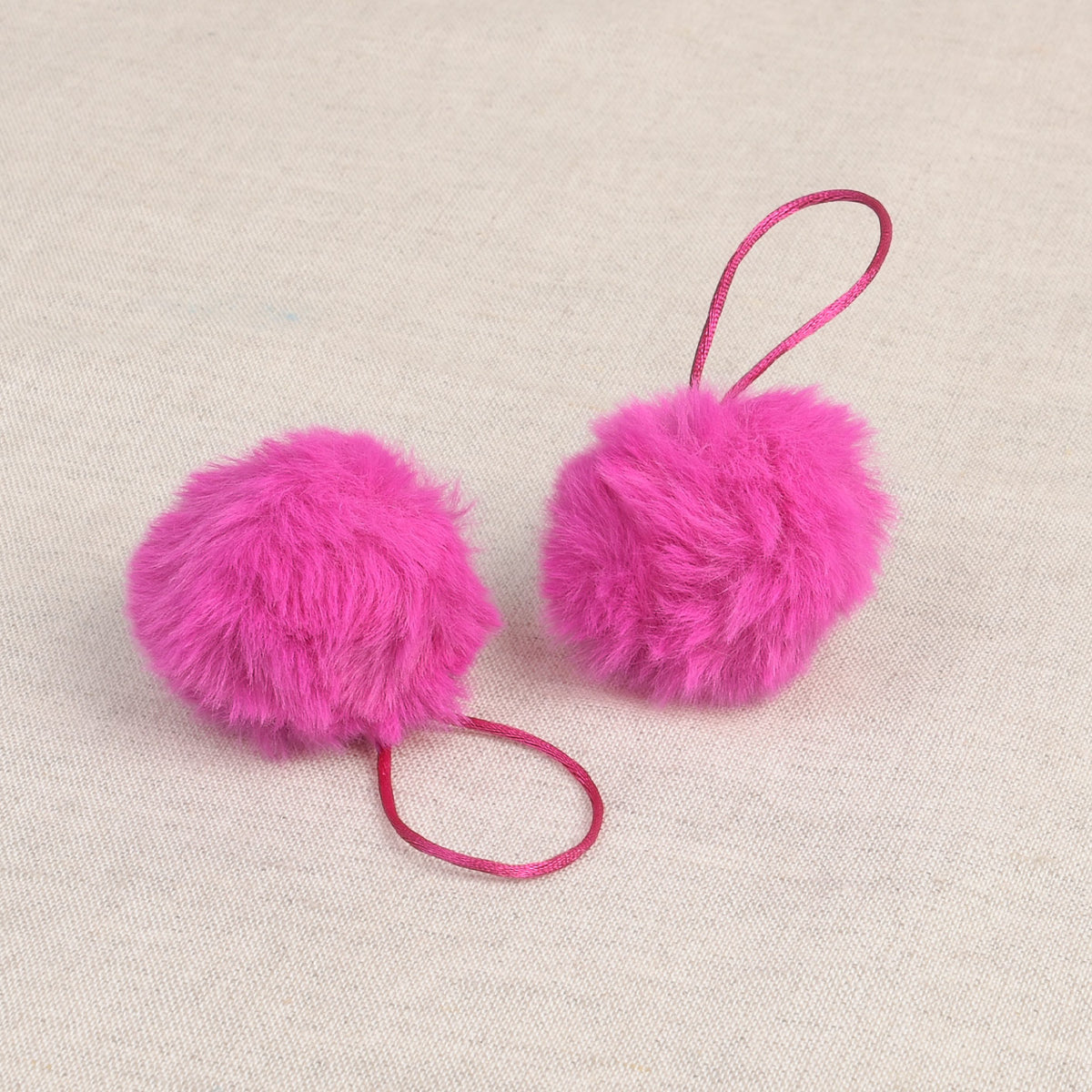 Neon Pink faux fur pom pom with loop
