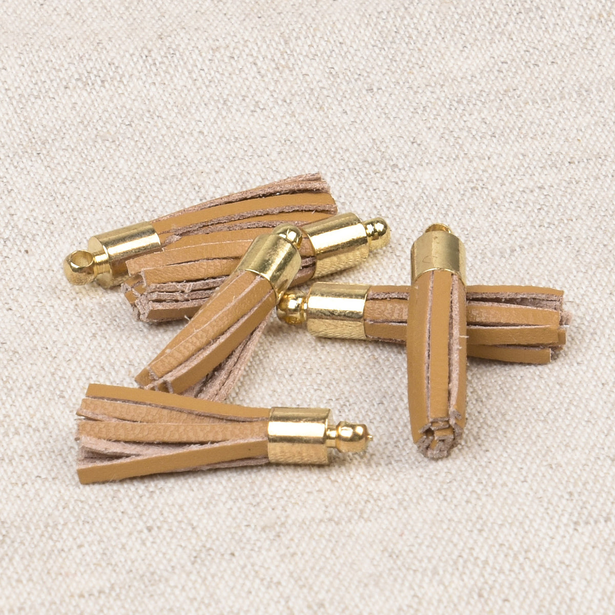 Small beige mini tassel