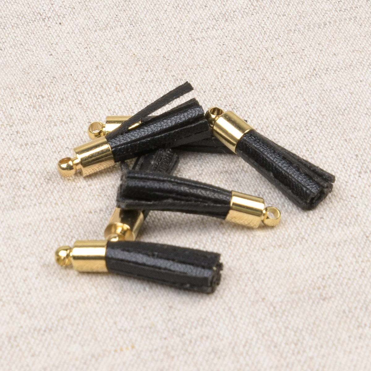 Small black mini tassel