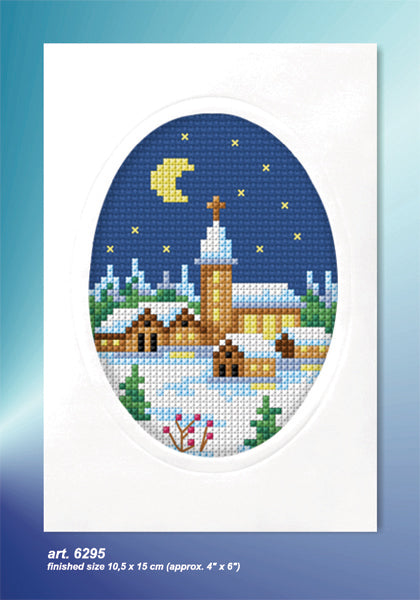 Cross stitch greetings card showing a church on navy fabric