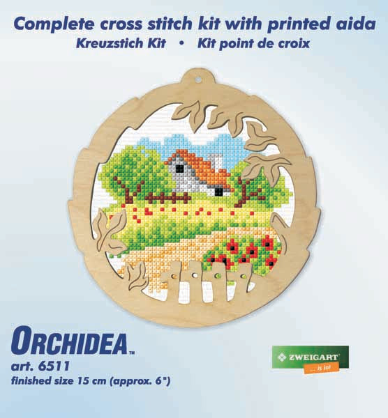 Orchidea cross stitch kit with a spring scene design in an engraved wooden frame