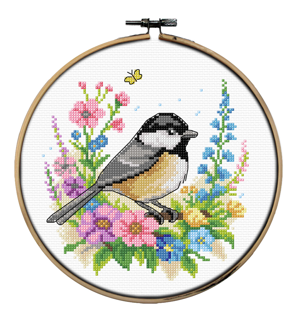 Orchidea bird cross stitch in an embroidery hoop