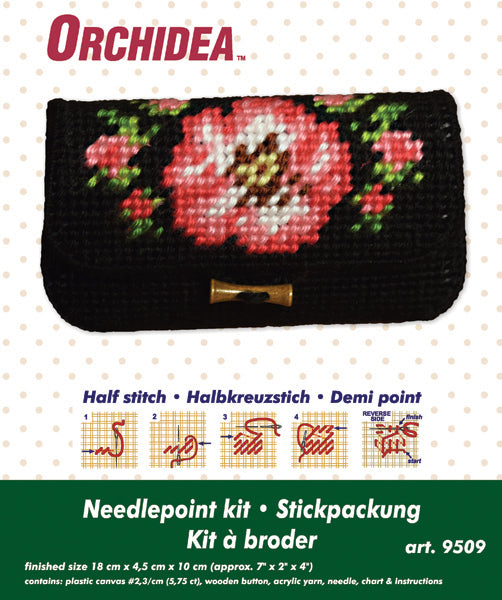 Needlepoint clutch bag with a wild rose pattern and wooden button