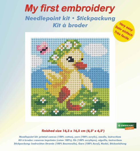 Finished beginner's needlepoint picture showing a chick