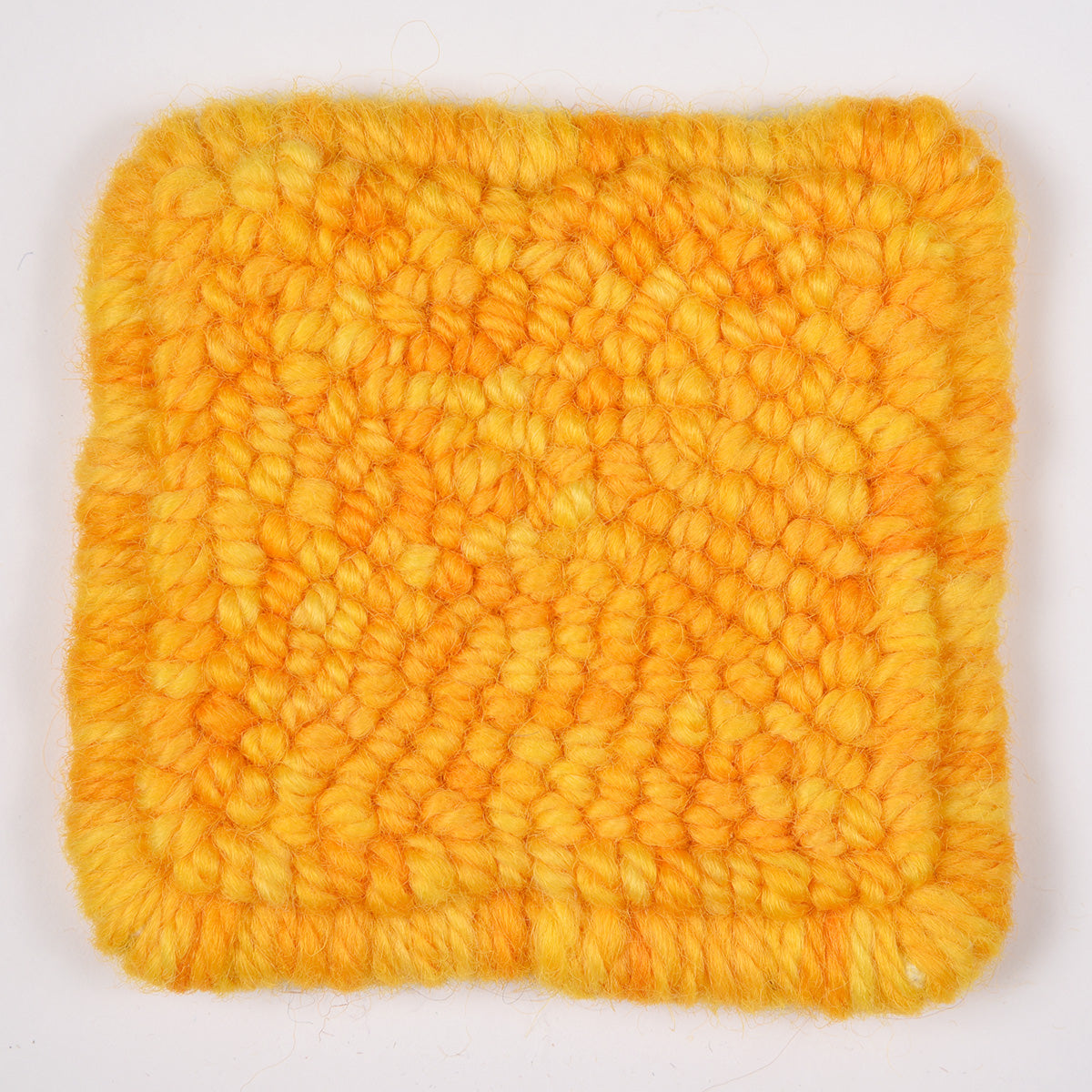 Skein of variegated Florida Juice rug weight punch needle wool yarn