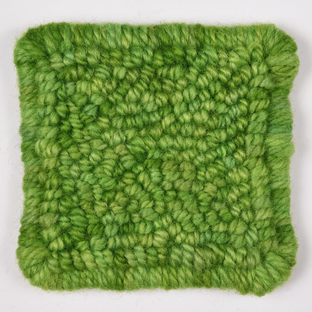 Skein of variegated Leaf Me Alone rug weight punch needle wool yarn