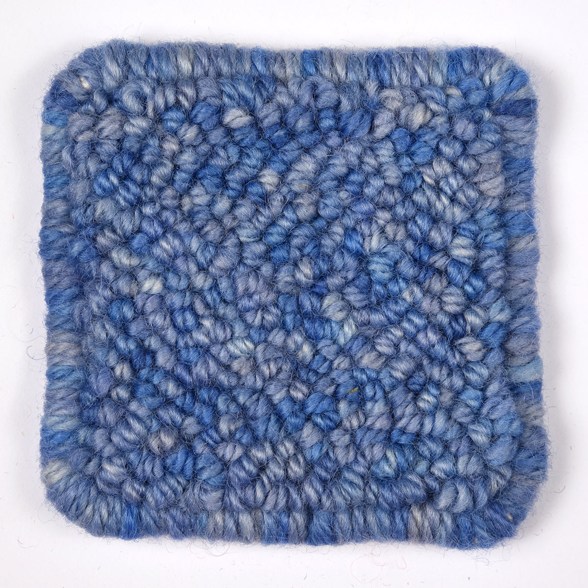 Skein of variegated Lobelia rug weight punch needle wool yarn