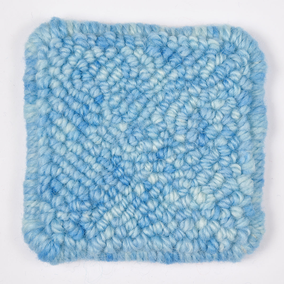 Skein of variegated Open Sky punch needle rug yarn