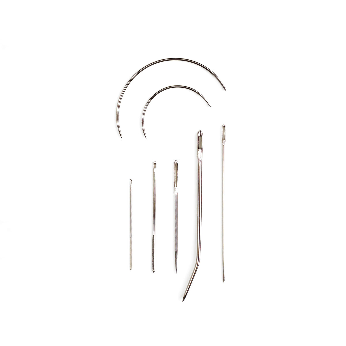 Card of 7 assorted Pony repair needles including curved needles