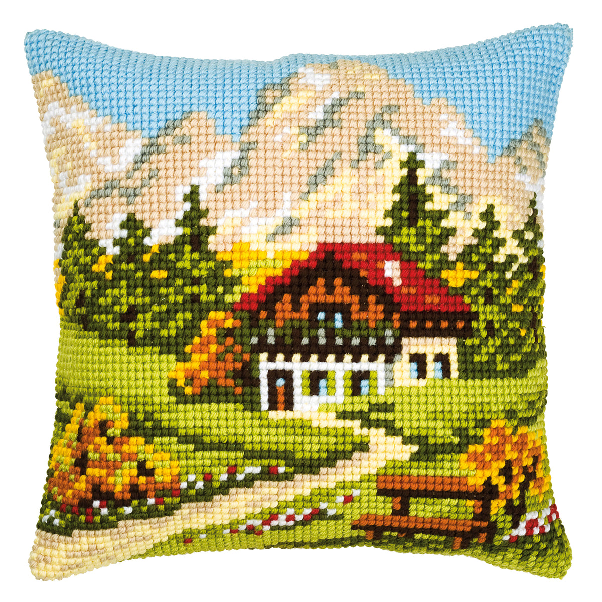 Finished cross stitch cushion showing a mountain scene