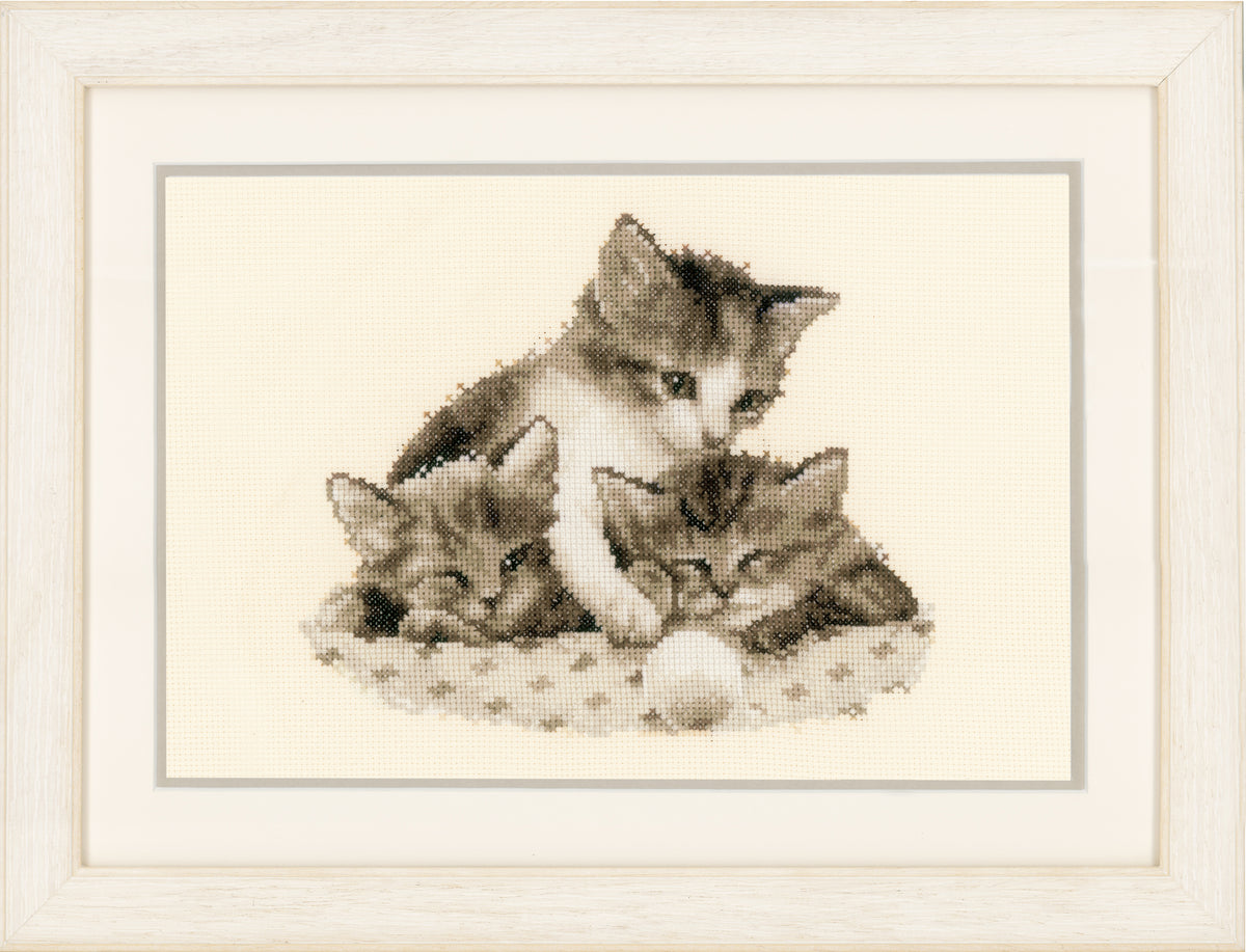 Counted cross stitch kit showing three little kittens