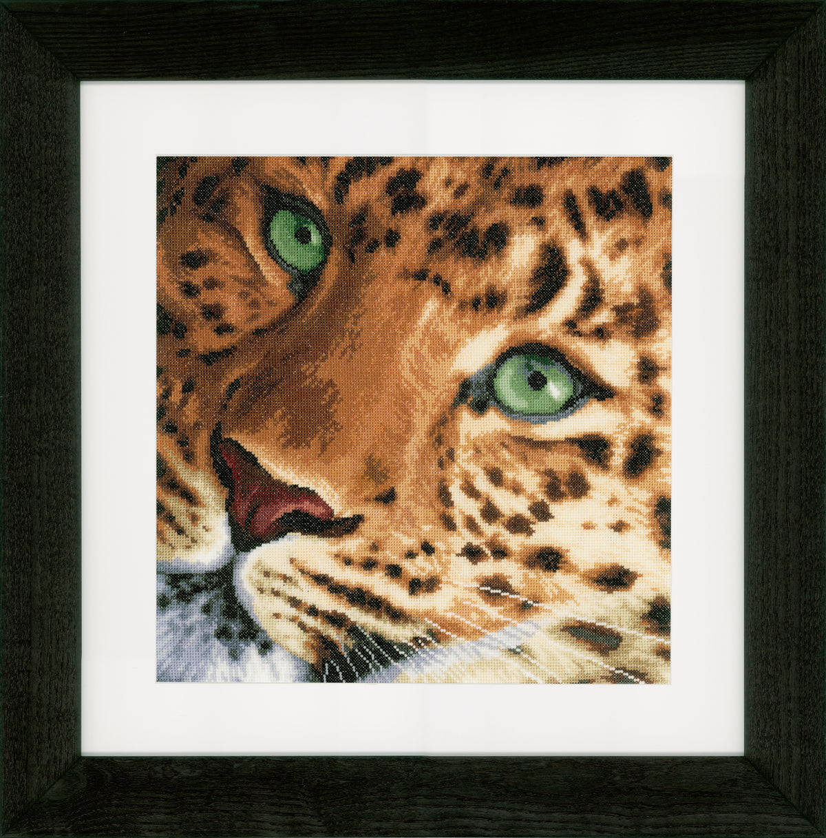 Cross stitch leopard portrait