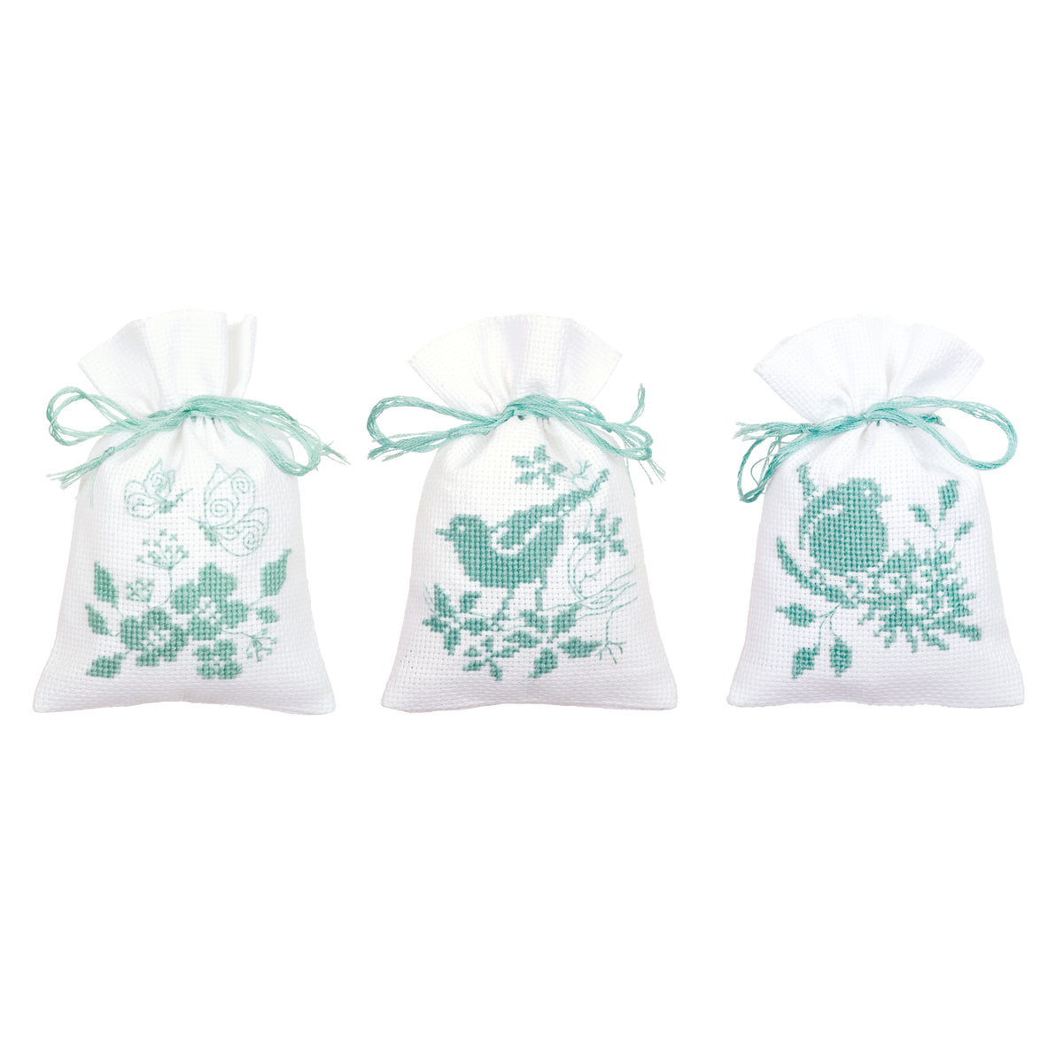 Three cross stitched gift bags with birds and blossom