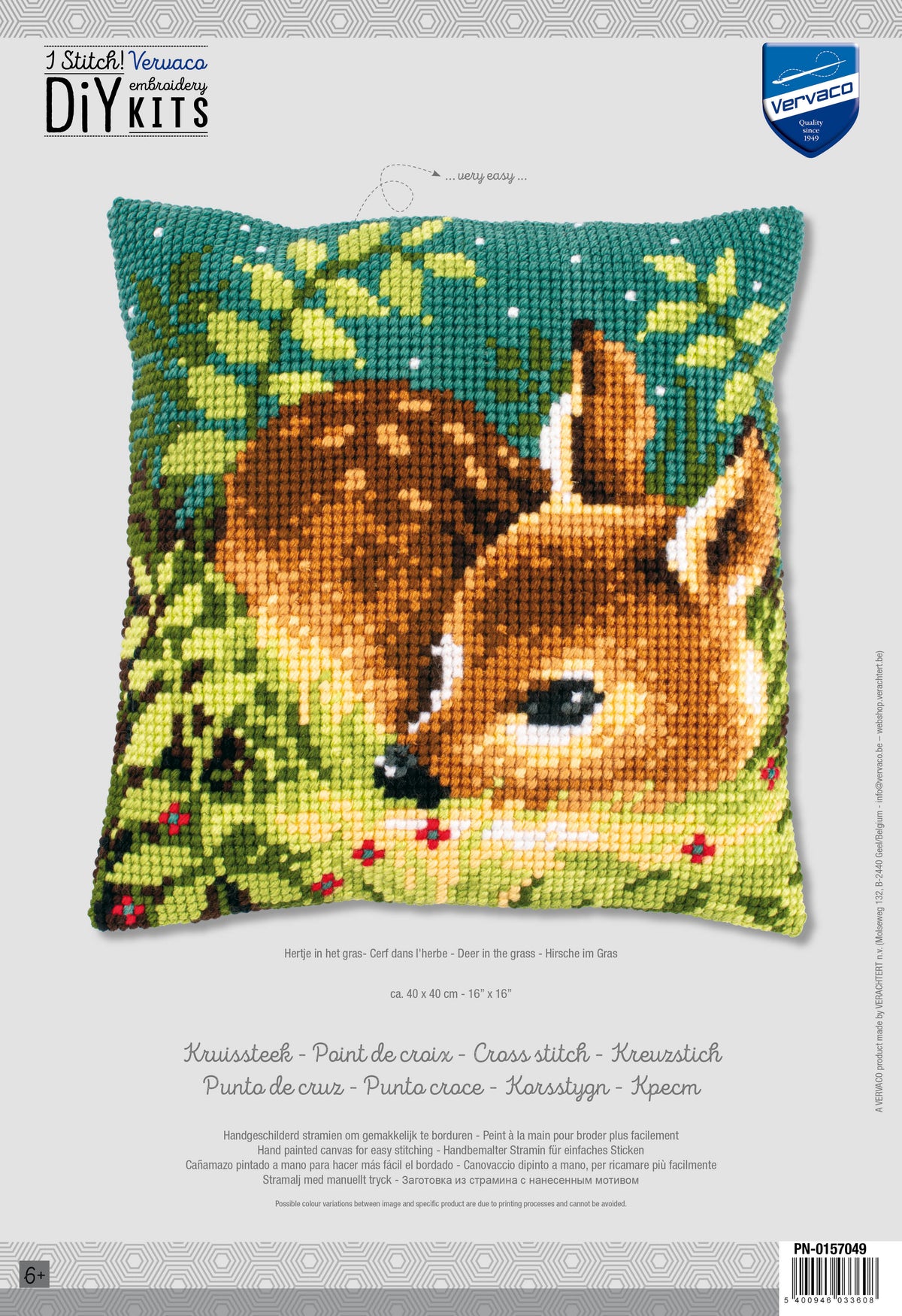 Cross stitch cushion with deer standing in grass