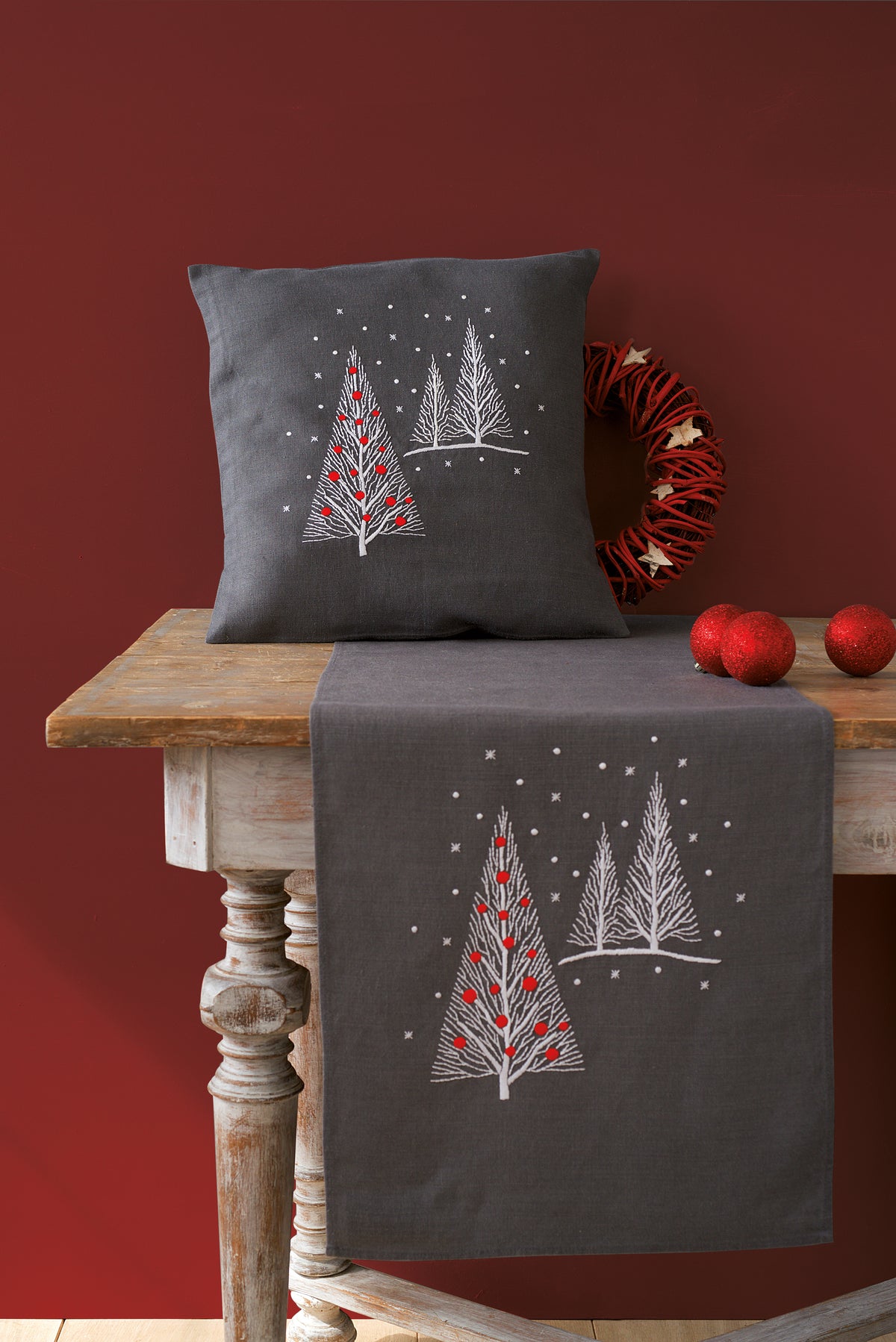 Dark grey embroidered table runner with Christmas trees