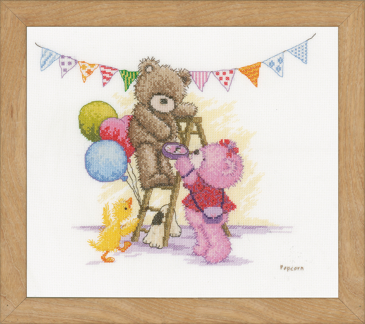 Finished Popcorn Bear Birthday counted cross stitch design