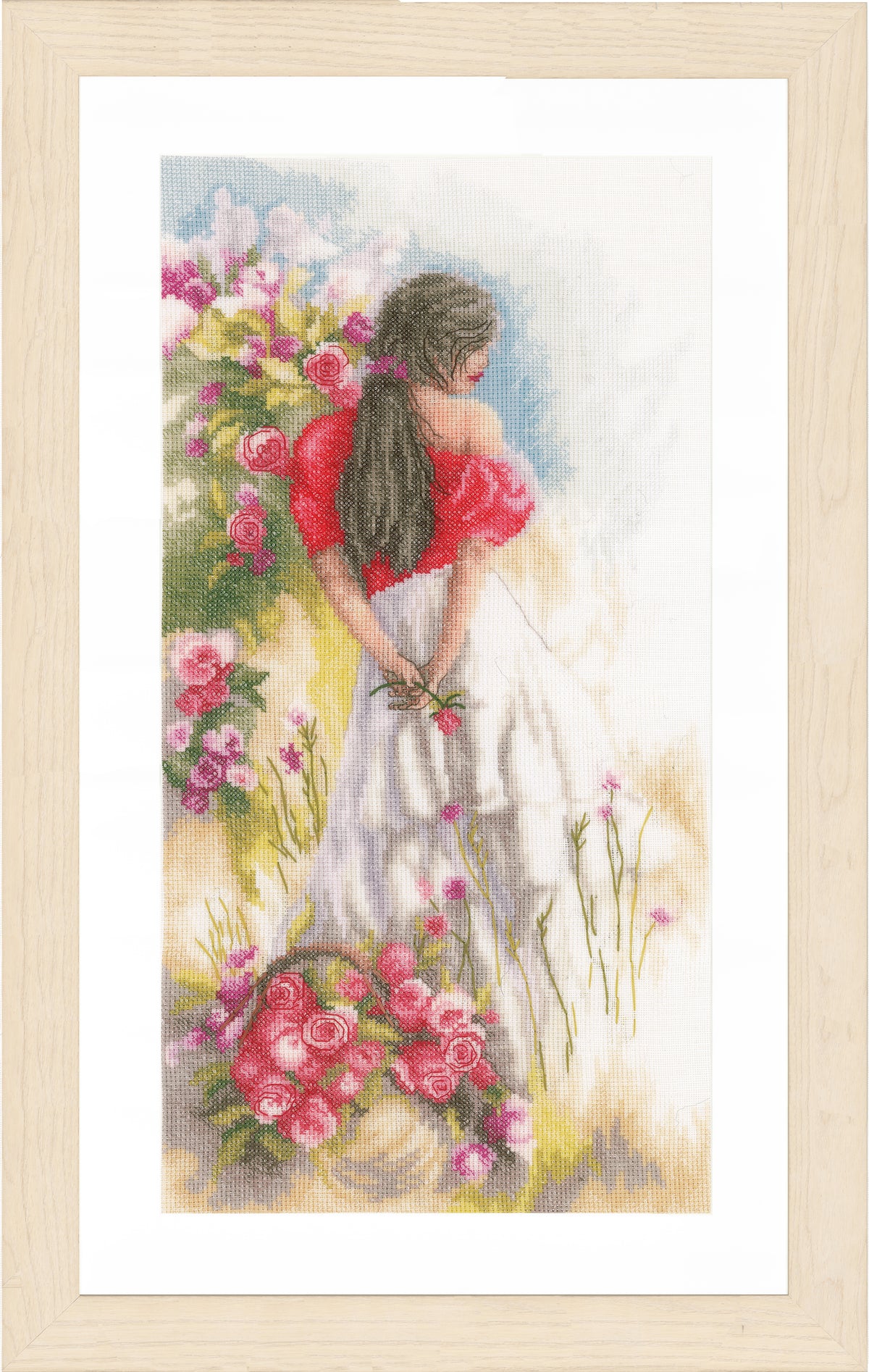 Cross stitch picture of a field scene
