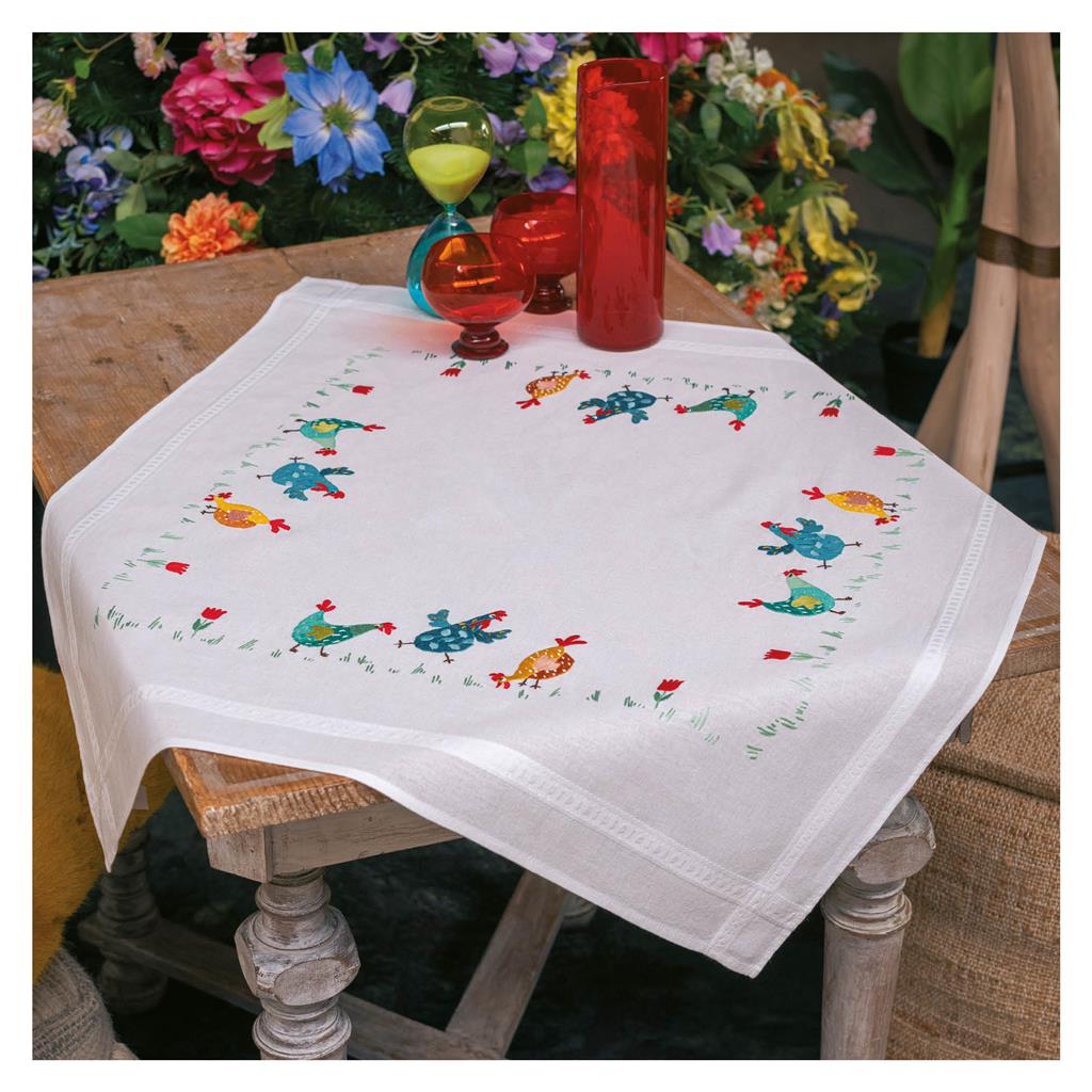 Embroidered tablecloth with colourful chickens