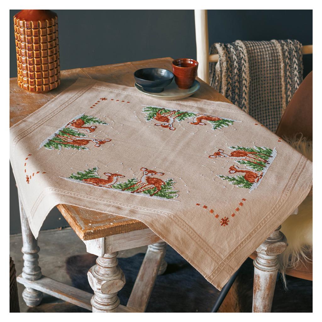 Ecru tablecloth embroidered with deer