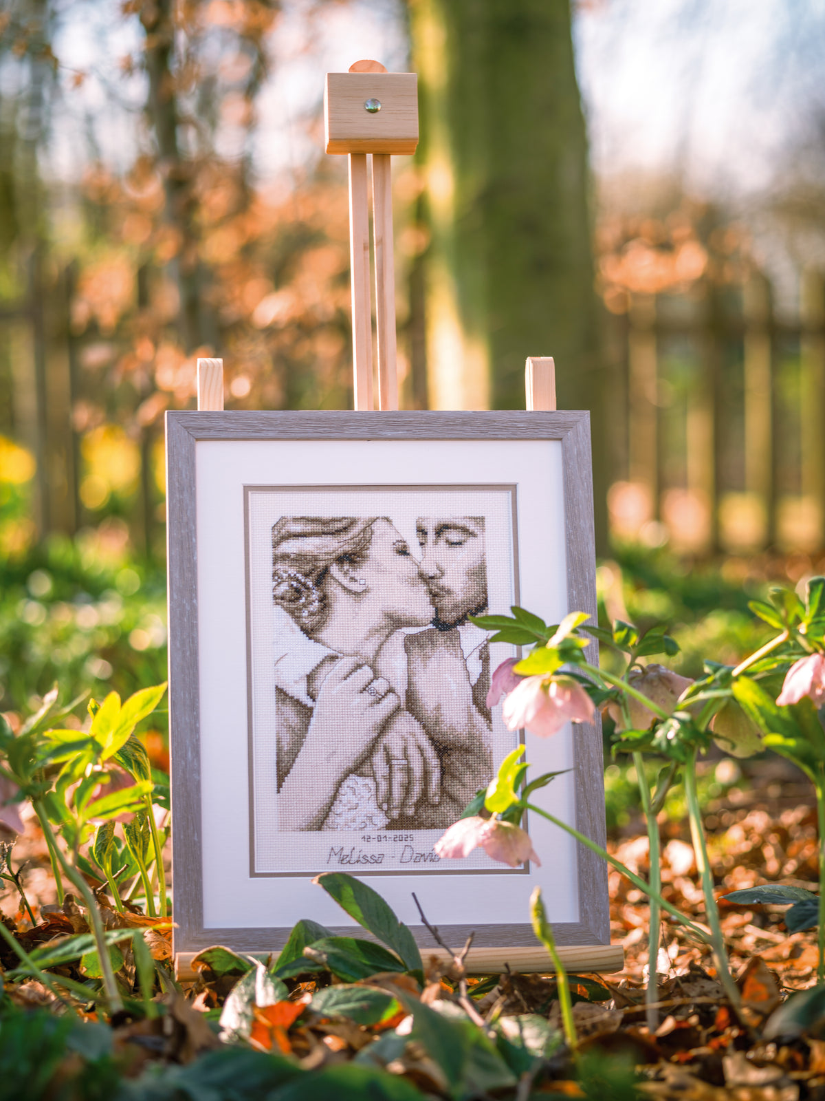 Cross stitch of a loving kiss