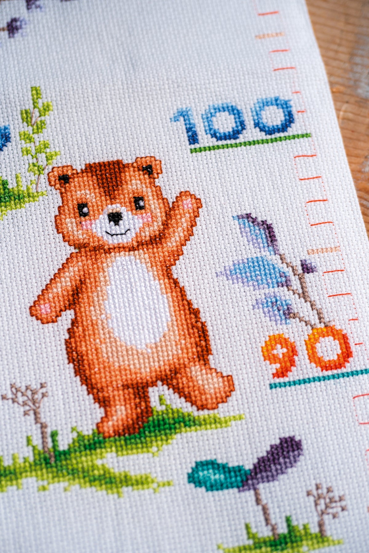 Vervaco Animals Height Chart counted cross stitch kit showing the finished design