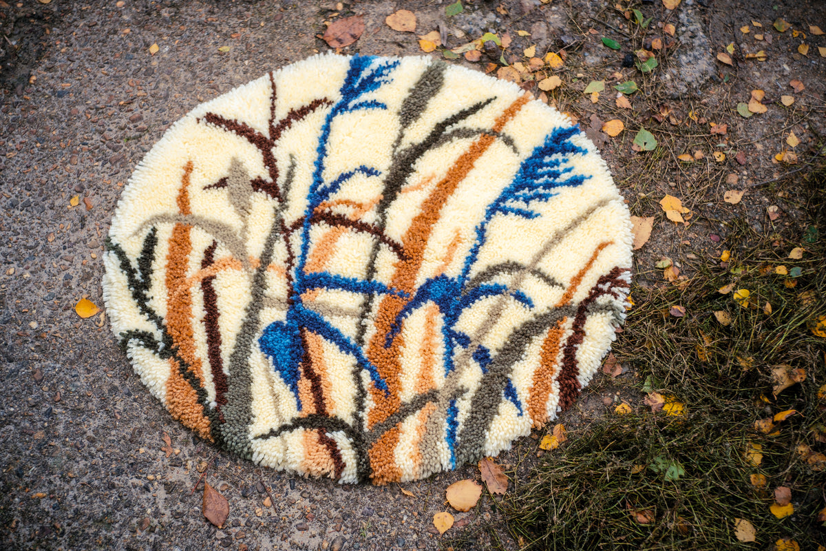 Vervaco grasses shaped latch hook rug kit showing the finished rug