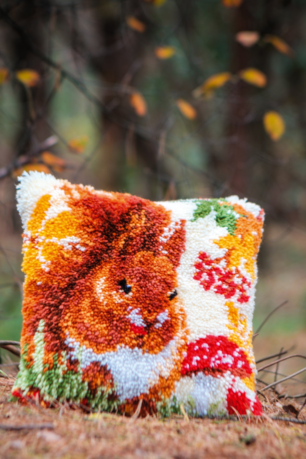 Vervaco squirrel in autumn latch hook cushion kit showing the finished cushion