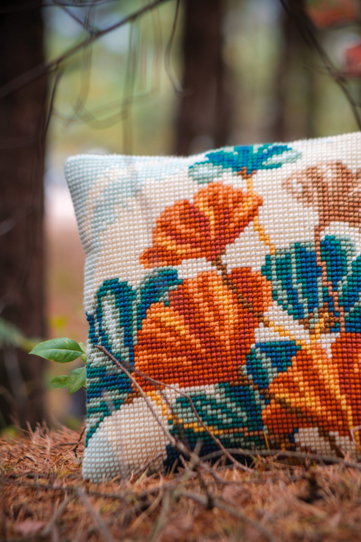 Vervaco Ginkgo Leaves cross stitch cushion kit showing the finished cushion