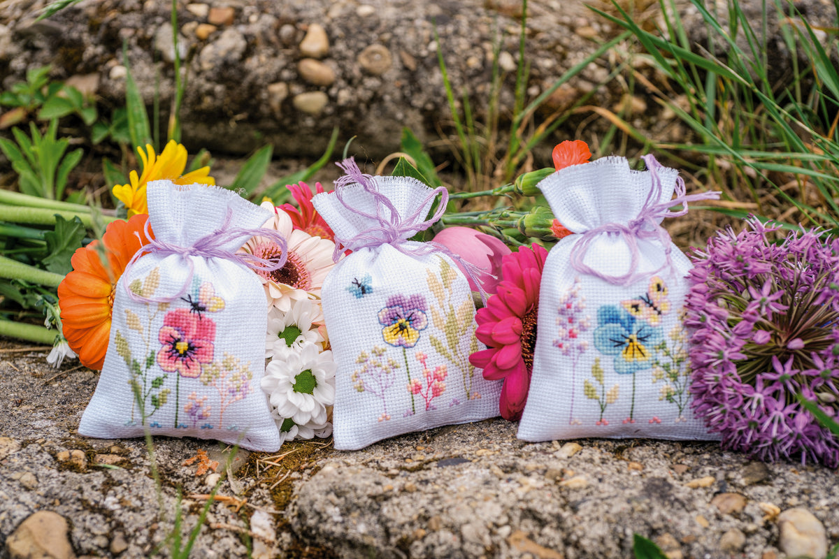 Vervaco Violets Gift Bags counted cross stitch kit showing the finished design