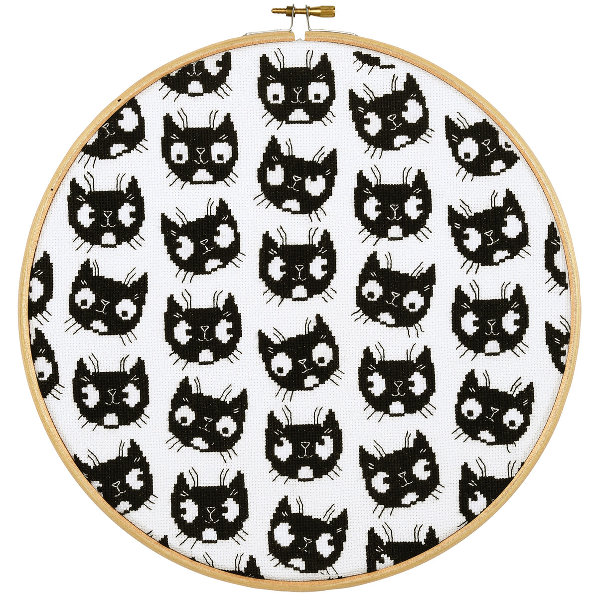 Eva Mouton black cats cross stitch design in an embroidery hoop