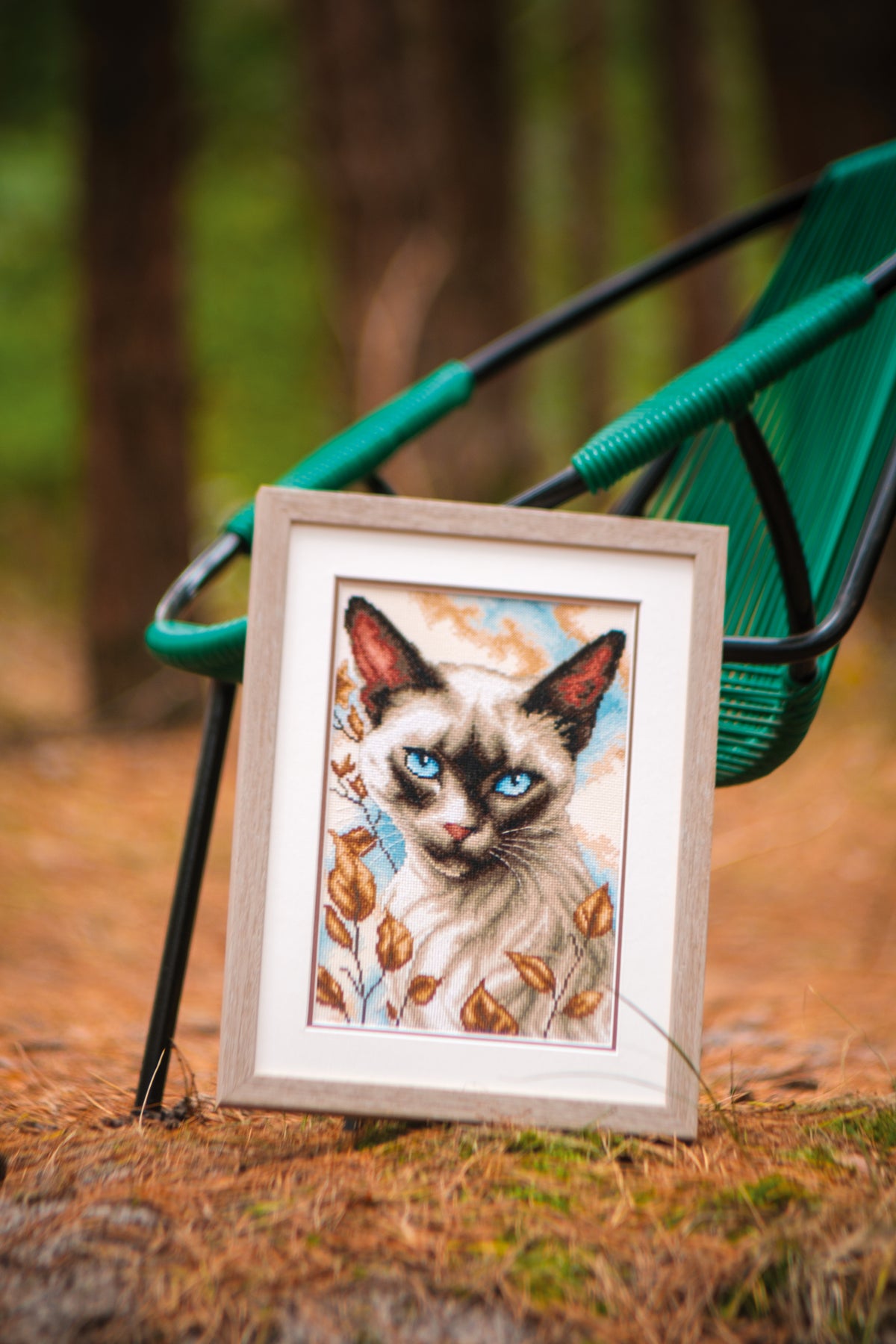 Cross stitch picture of a Siamese cat