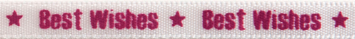 Reel of narrow white satin ribbon printed Best Wishes in pink