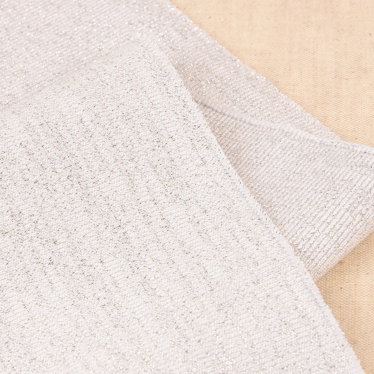 White and silver metallic knit cuff and waistband trim