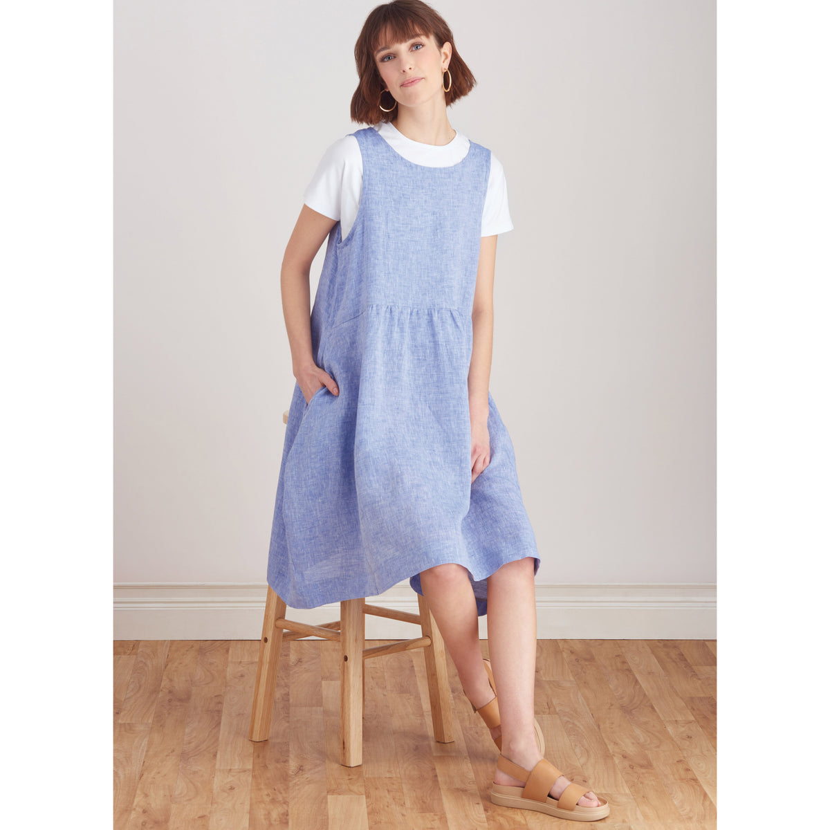 Simplicity S9596 sewing pattern envelope showing a dress