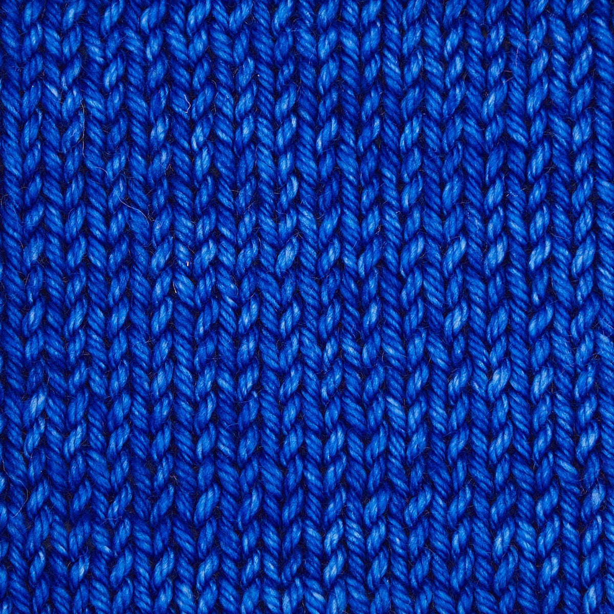 Skein of cobalt blue Bella merino worsted yarn