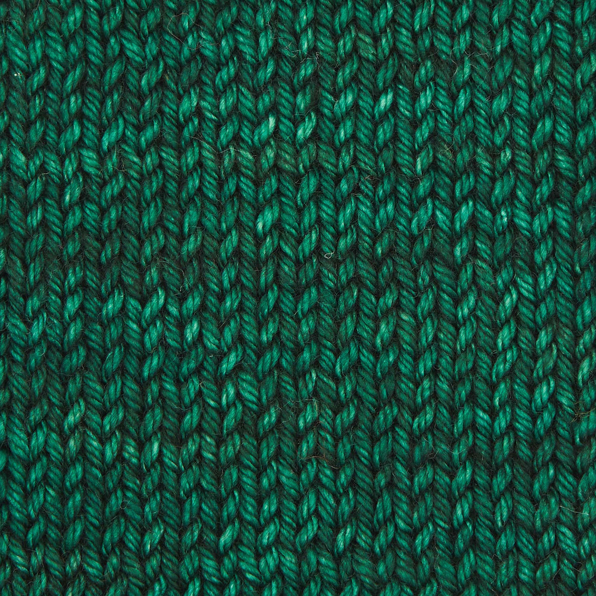 Skein of deep emerald Bella merino worsted yarn