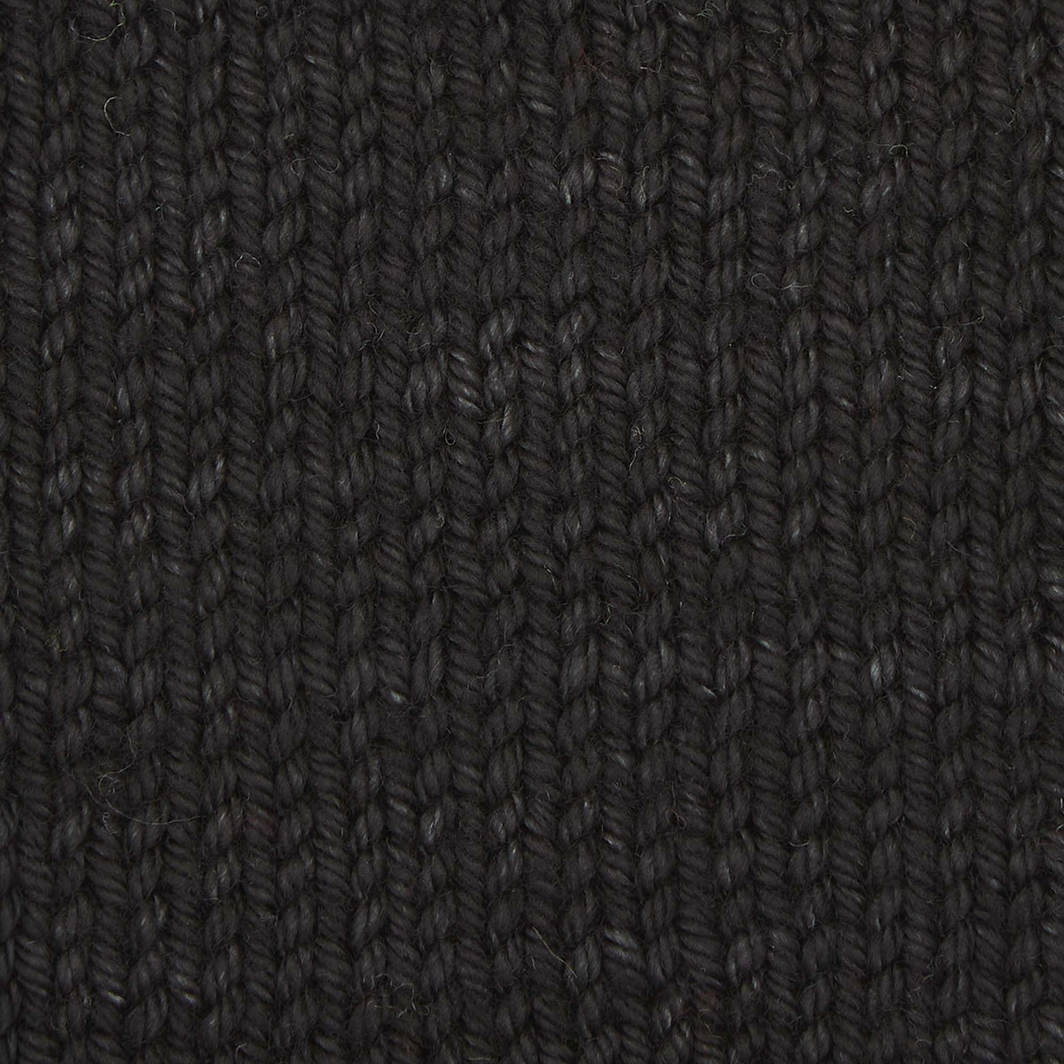 Skein of Symfonie Bella semi-solid merino yarn in Jet Black