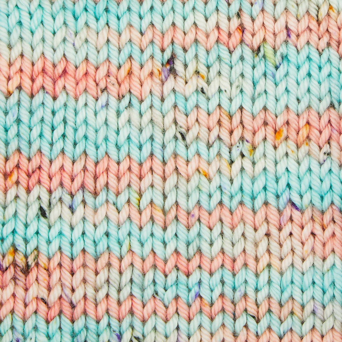 Skein of Symfonie Bella variegated merino yarn in Bonnie Blooms